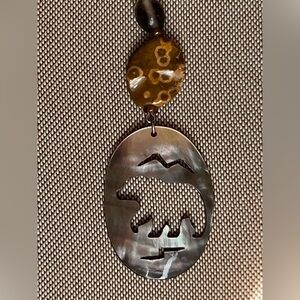 Vintage Native American cut out pearl Inlaid Zuni Bear necklace stone pendant
